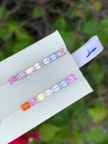 Natural pastel sapphire emerald cut 7-piece set 4x3mm close up unheated African sapphire