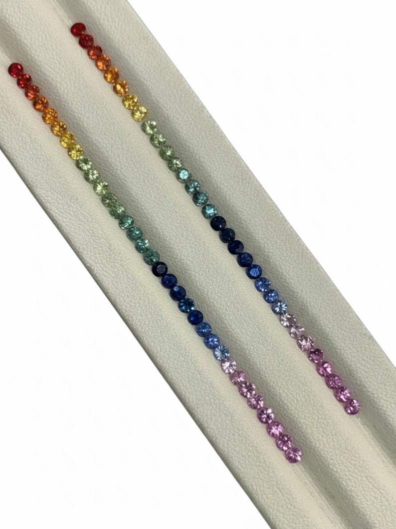 Professionally matched Rainbow Sapphire calibrated gemstone layout for jewelers