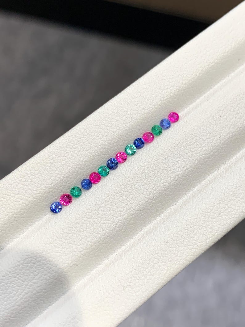 Luxury round Sapphire Ruby Emerald calibrated gemstone layout for custom ring making