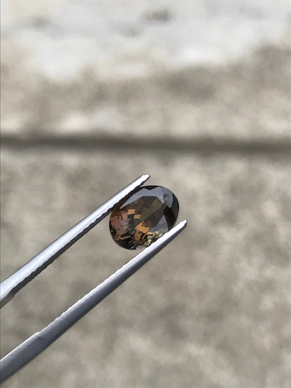 8.4x6.4mm bi-color tanzanite oval gem, photo 4